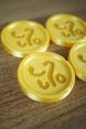 3D printed Palia coin close-up gold color