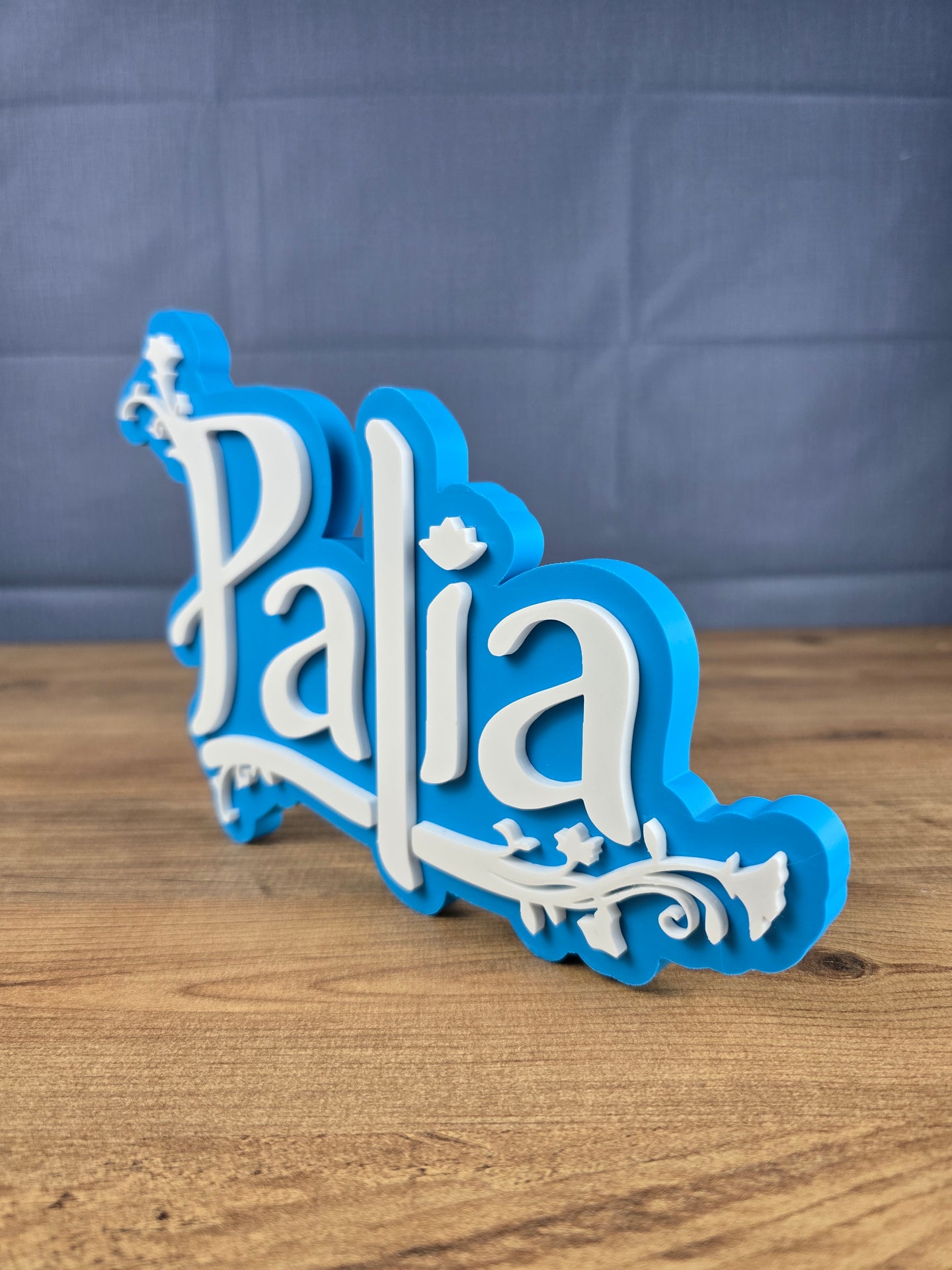 Palia fan art display stand on wooden desk