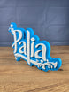 Palia fan art display stand on wooden desk