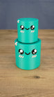 Small teal Palia Green Cylinder plush stacked on top of the larger size, showing both 3D printed size options.
