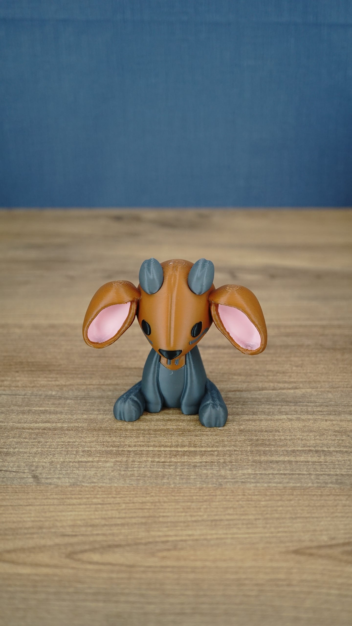 Front view of the Highlands Sernuk-inspired plush figure with blue and dark gray coloring.