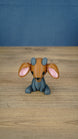 Front view of the Highlands Sernuk-inspired plush figure with blue and dark gray coloring.