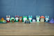Palia plush-style figures collection with Chapaa, Frogbert, Kitsuu, Sernuk, Flutterfox and other fan-made game collectibles for display