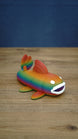 Large rainbow Palia Prismfish 3D printed figure shown from the side, with orange, green, blue, and purple colouring.