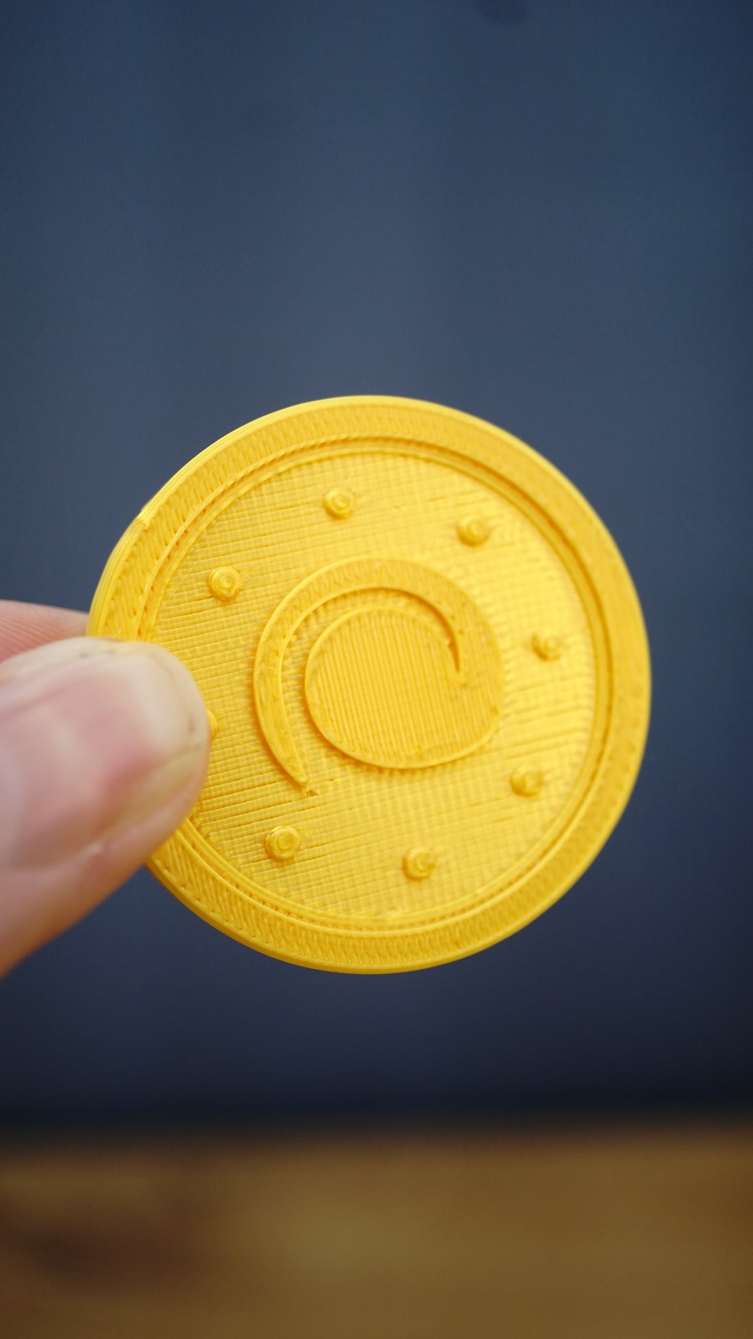 Single Palworld Gold Coin replica shown for size reference, measuring approximately 4 cm and finished in shiny gold silk PLA for a bright metallic look.