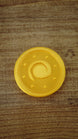 Close-up of a fan-made Palworld Gold Coin replica with a shimmering gold silk finish, approximately 4 cm in size, designed as a gaming collectible.
