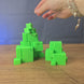 Glow-in-the-dark Subnautica Ion Cube keychain shown being held and rotated by hand, designed as a gaming accessory, collectible, or gift for Subnautica fans.