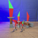 3D-printed RuneScape dragon dagger replica shown being held and rotated by hand, featuring a red blade and game-inspired fantasy design.