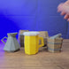 3D-printed Old School RuneScape pen pot set with jug, bucket, pot of flour, barrel, and beer mug designs for gaming desk storage.