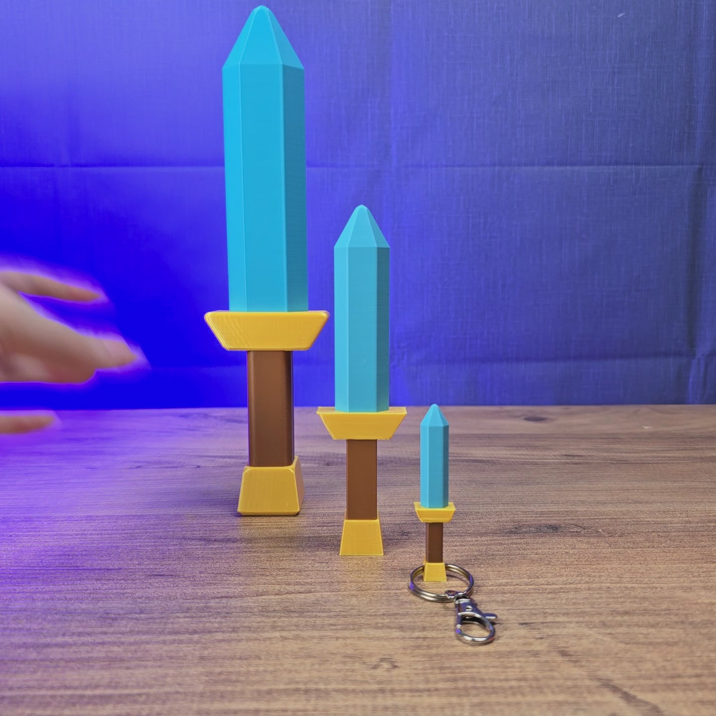 3D-printed RuneScape-inspired dagger replica shown being held and rotated by hand, designed as an OSRS-style fantasy weapon display piece.