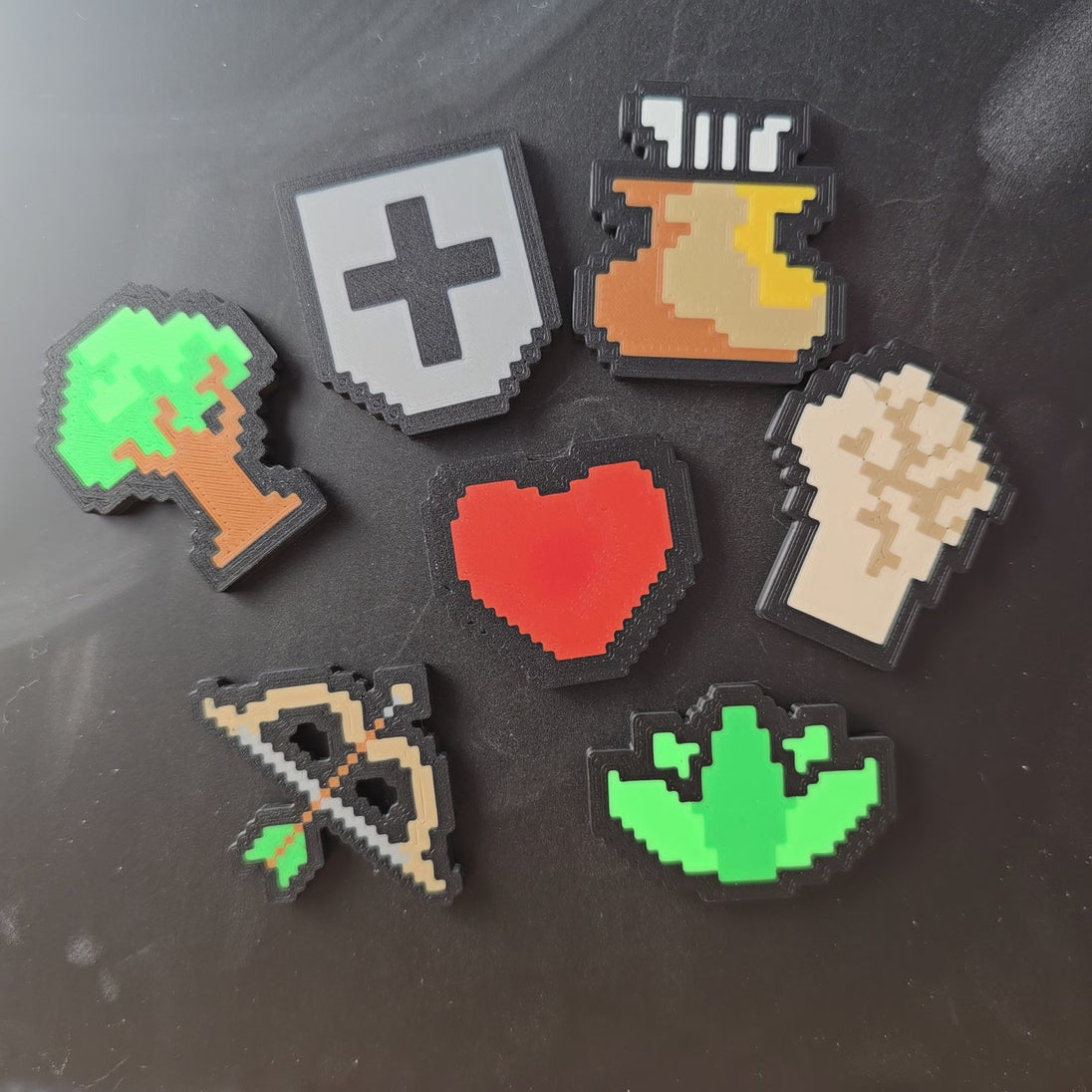 3D-printed Old School RuneScape skill magnets shown being held and displayed, featuring multiple OSRS skill icon designs for fridges, magnetic boards, or gaming setups.
