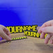 Personalised RuneScape-style custom nameplate shown being held and displayed, featuring OSRS-inspired lettering for gaming desks, shelves, or display setups.