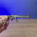 MK47 rifle keyring shown being held and rotated by hand, designed as a miniature rifle-inspired accessory or keychain.