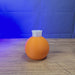 3D-printed Factorio flask pen pot shown from multiple angles, with an orange body, white top, and a black pen inserted.