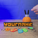 Factorio-inspired 3D-printed gift bundle with a logo nameplate, flask pen pot, and keyring, shown being handled and displayed together.