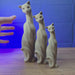 Cat figurine replica inspired by Escape from Tarkov shown being held and rotated by hand, designed as a gaming display piece, collectible, or Tarkov fan gift.