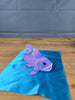 purple fish plush inspired by ancient fish palia