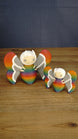 Large 12 cm and small 8 cm Rainbow-Tipped Butterfly Plush figures inspired by Palia, shown together with rainbow bodies and detailed grey wings.