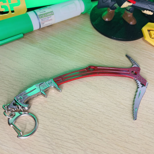 Red Rebel Ice Pick Keyring Replica In Hand