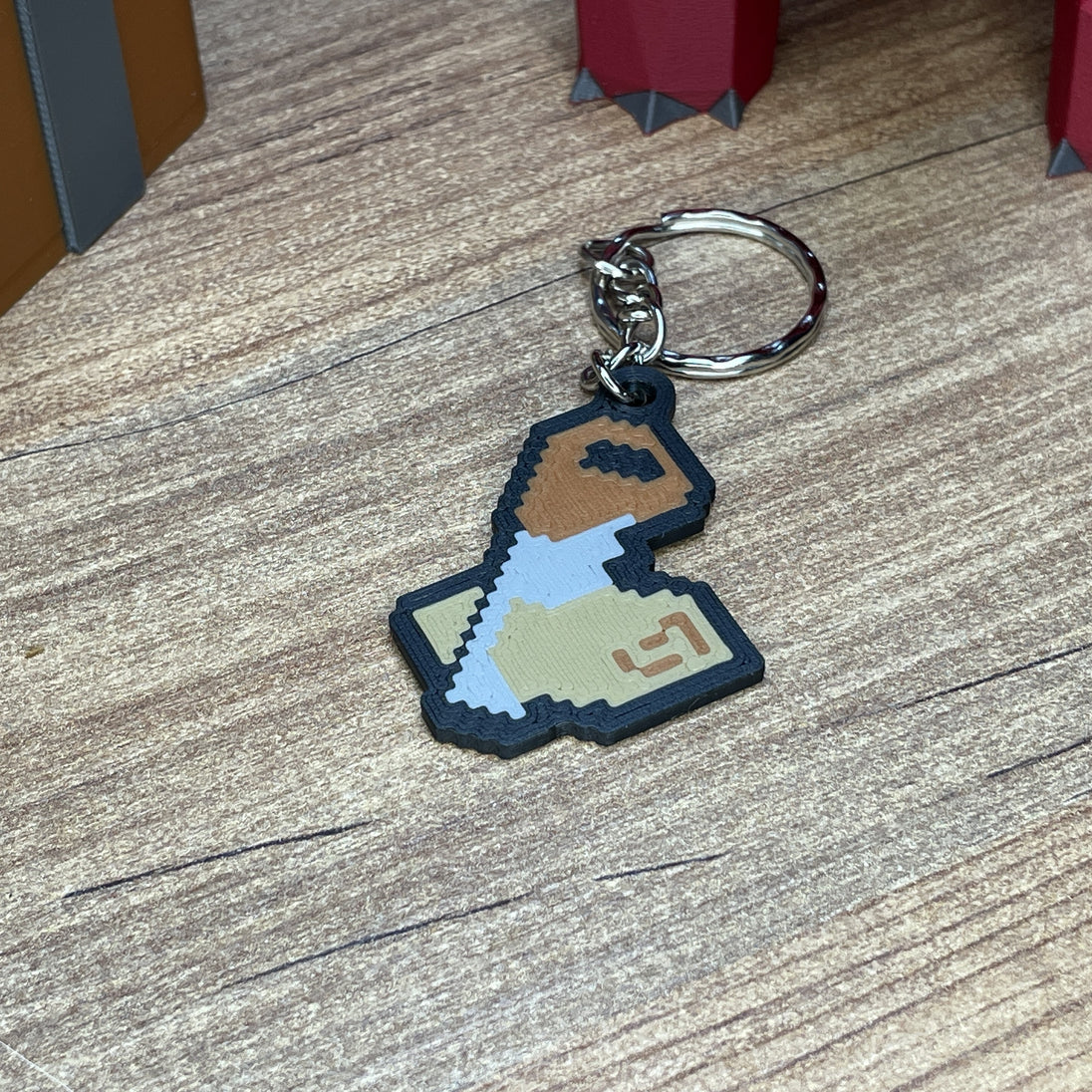 3D printed OSRS skill icon keychains