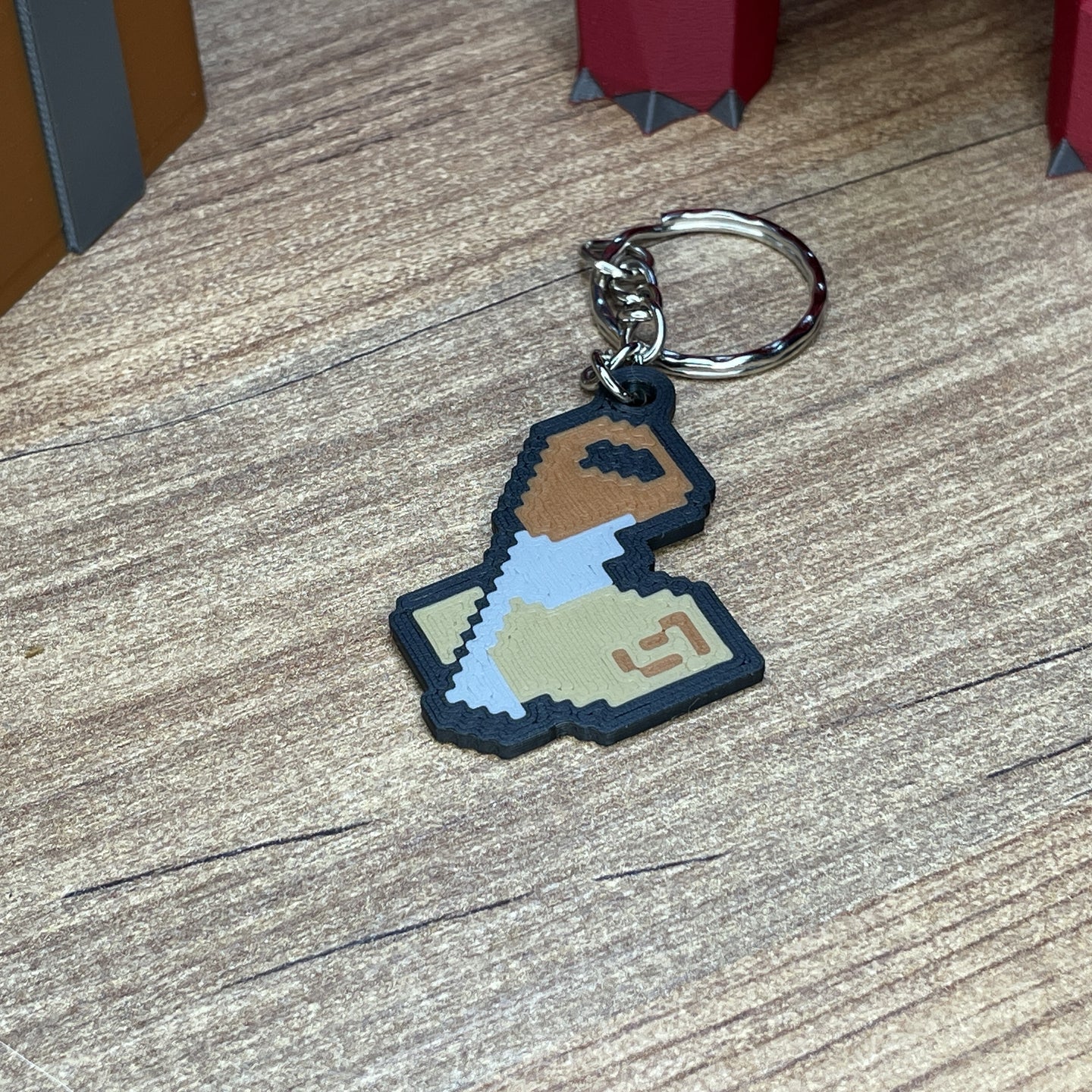 3D printed OSRS skill icon keychains