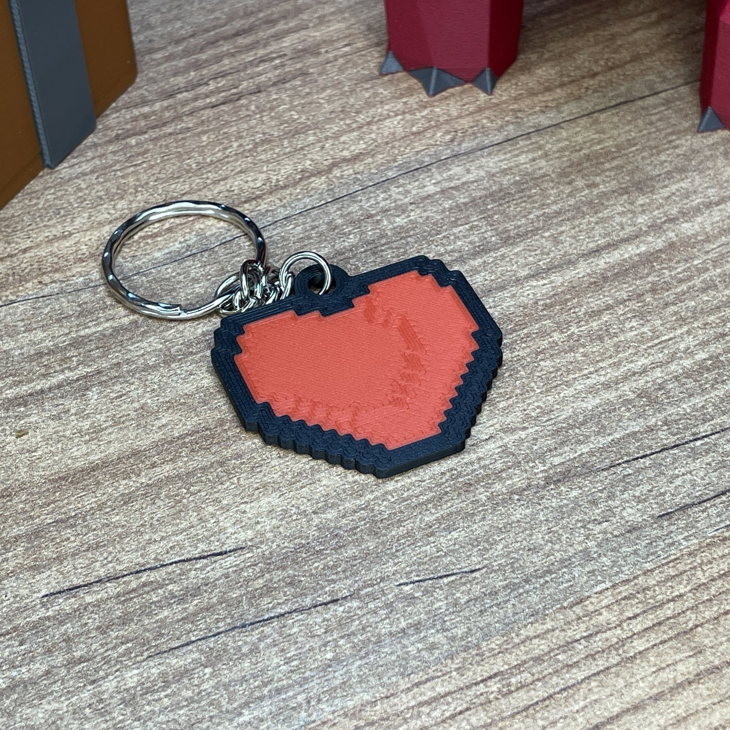 3D printed OSRS skill icon keychains