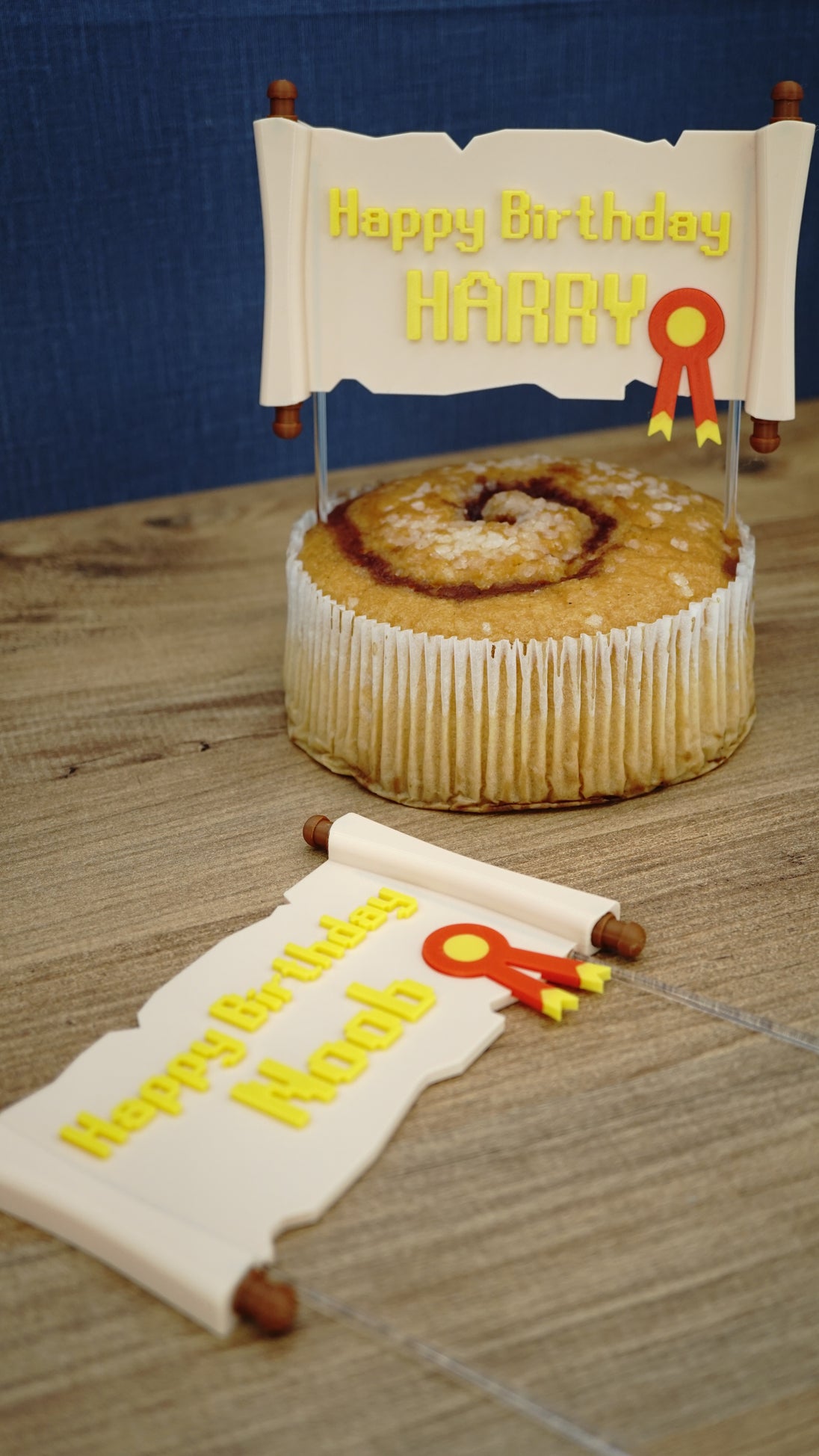 RuneScape-inspired birthday cake topper shown with matching custom scroll design, clear dessert sticks, and gamer party cake display.
