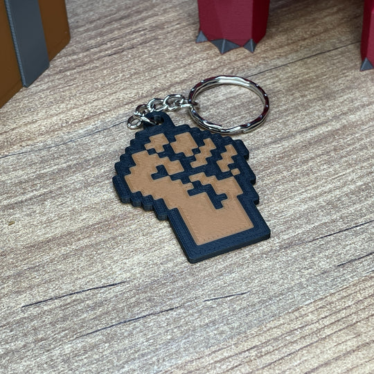 3D printed OSRS skill icon keychains