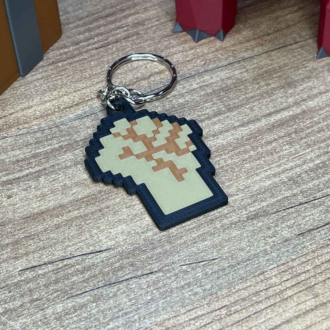 3D printed OSRS skill icon keychains