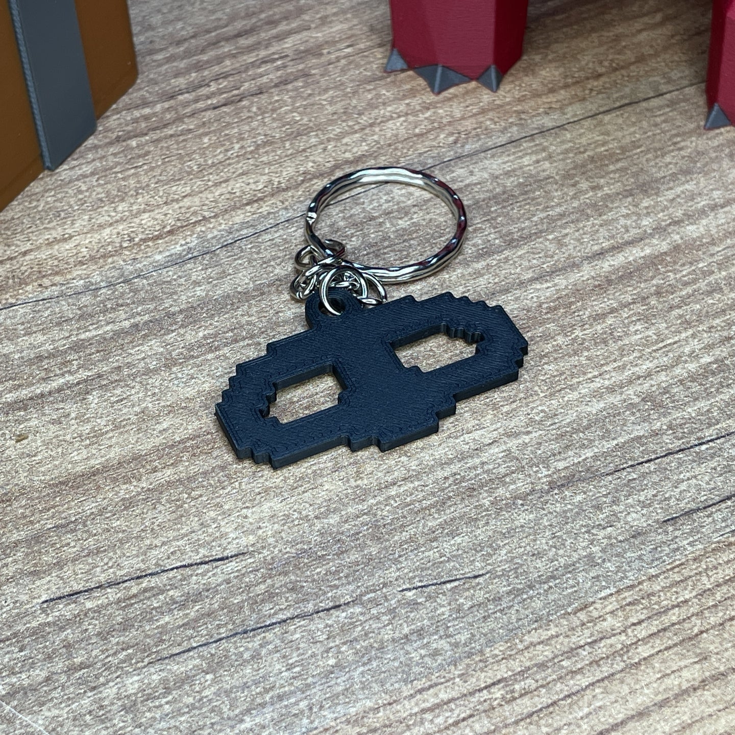 3D printed OSRS skill icon keychains