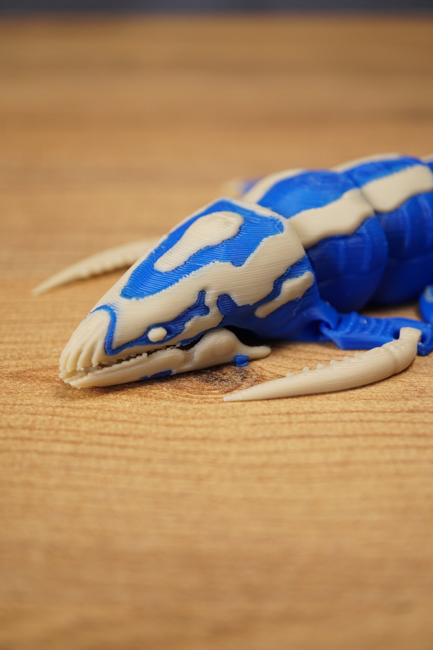 Close-up of the Shiver Leviathan head and front claws, showing bone colour jaw details, blue markings, and creature styling.