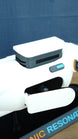 Detailed upper side view of Sonic Resonator replica showing raised top housing, cyan control button, hinged panel and futuristic Subnautica 2 styling