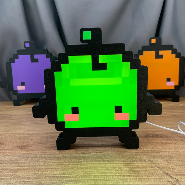 Stardew Valley Junimo LED light box green color on desk
