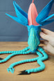 Large Collector Leviathan fan figure with hand for size comparison, blue fins, coral head crest, and poseable tentacles