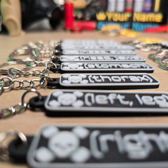 Close-up view of debossed Tarkov Death Keyring texture

