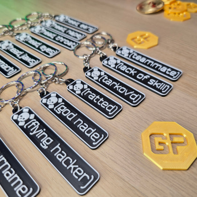 Close-up view of debossed Tarkov Death Keyring texture
