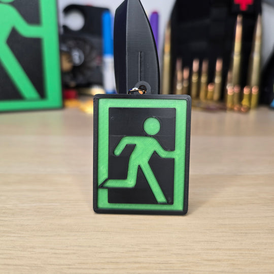 Close-up of Embossed Tarkov Extraction Symbol Keyring
