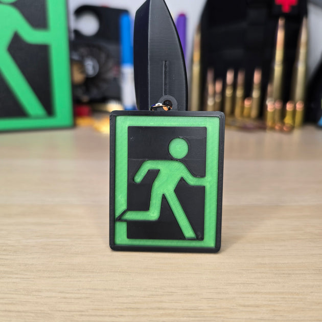 Close-up of Embossed Tarkov Extraction Symbol Keyring
