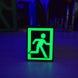 Glowing Effect of Tarkov Extraction Symbol Keyring in Dark

